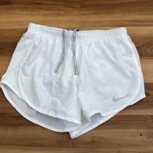 white nike running shorts